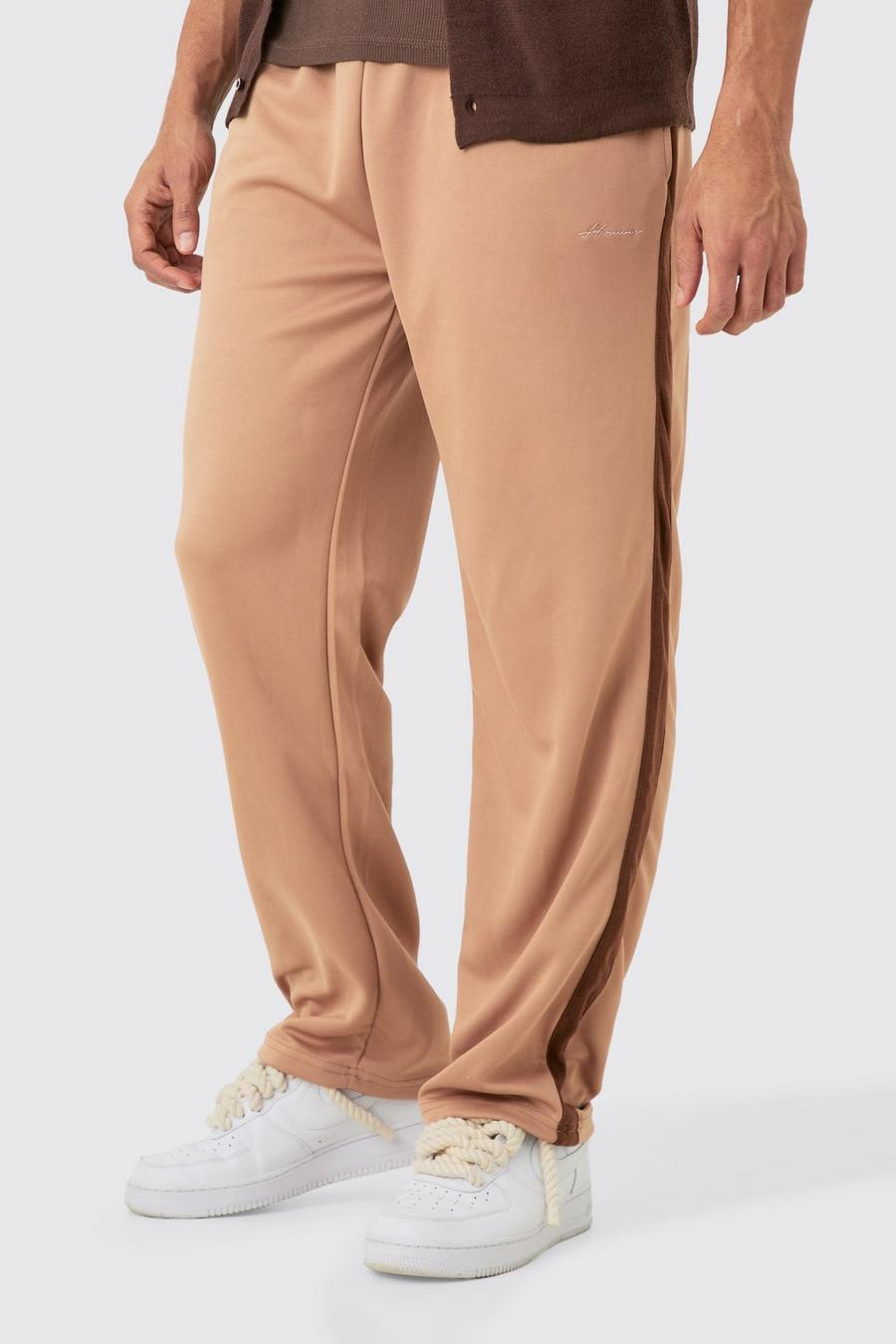 Pantaloni tuta rilassati Homme in tricot con striscia ricamata, Brown image number 1