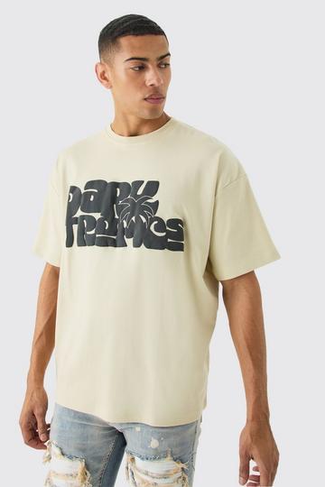 Oversized Interlock Dark Tropics T-shirt sand
