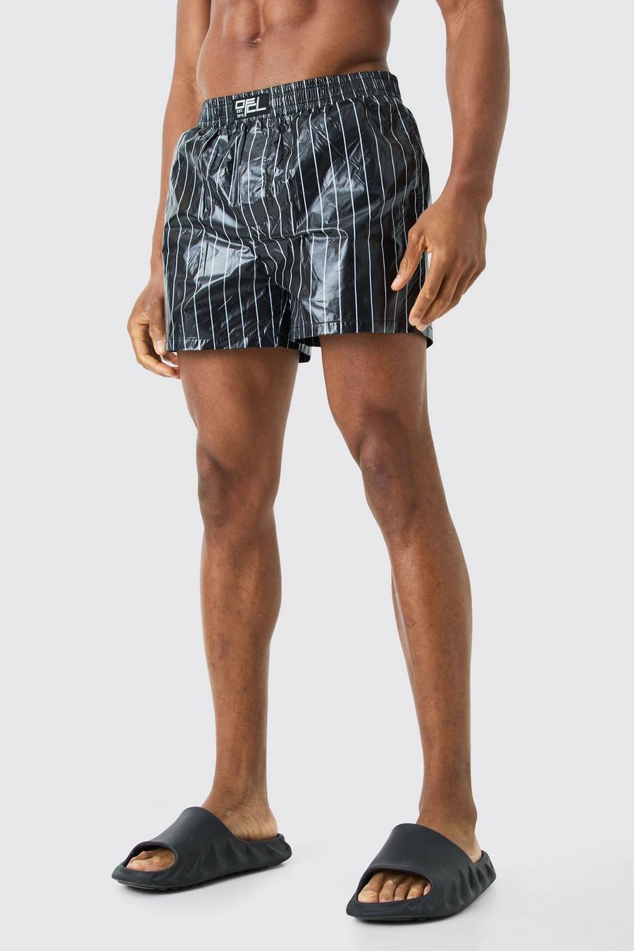 Short de bain court à slogan - Ofcl, Black