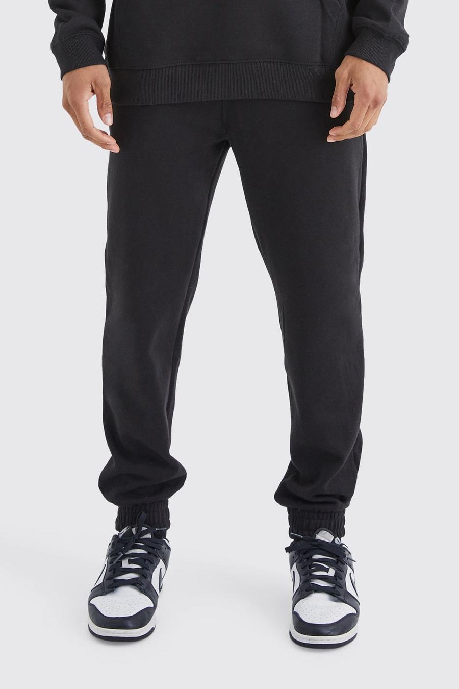 Pantalón deportivo Regular con firma MAN, Black image number 1