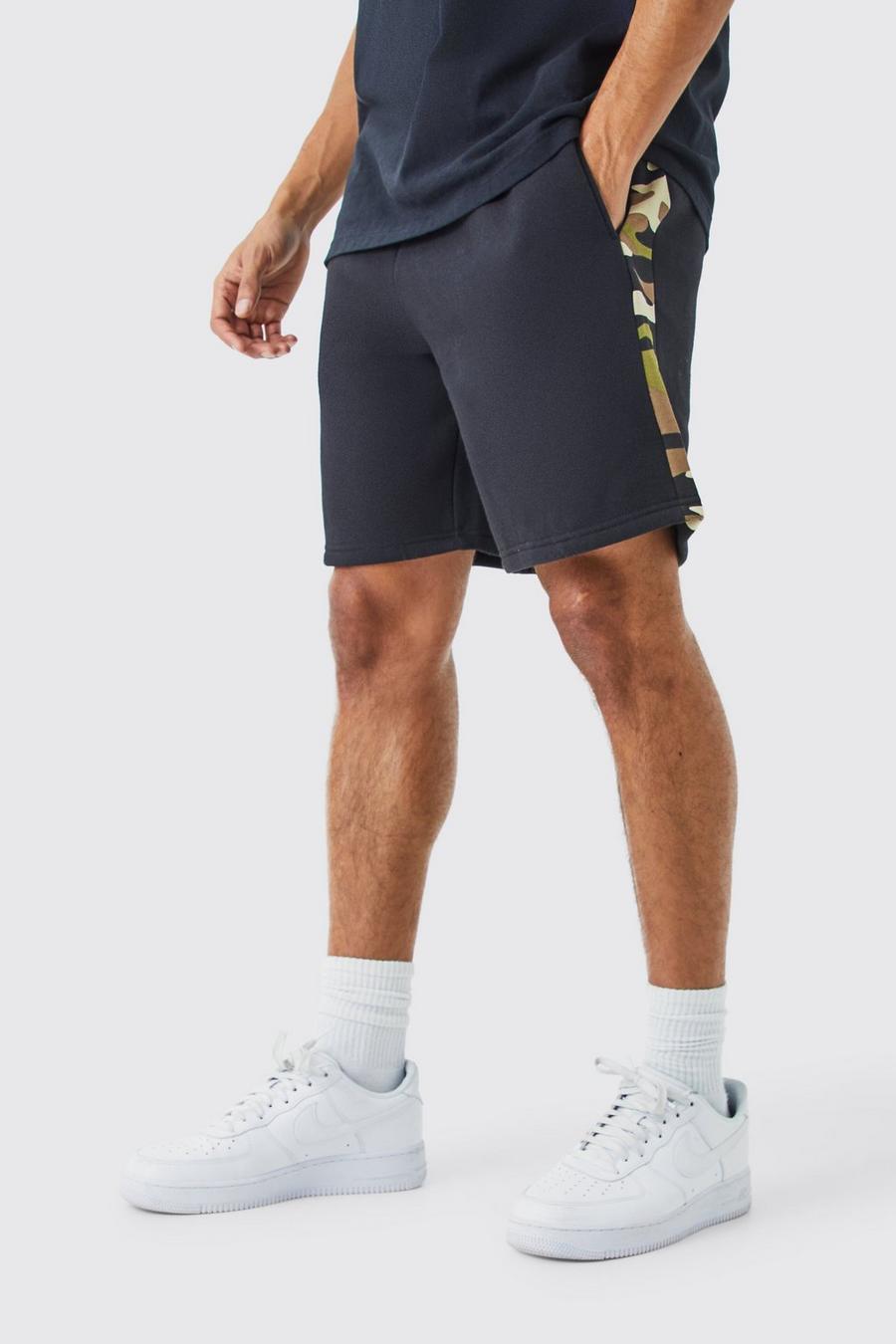 Black Kamouflagemönstrade shorts med sidopaneler