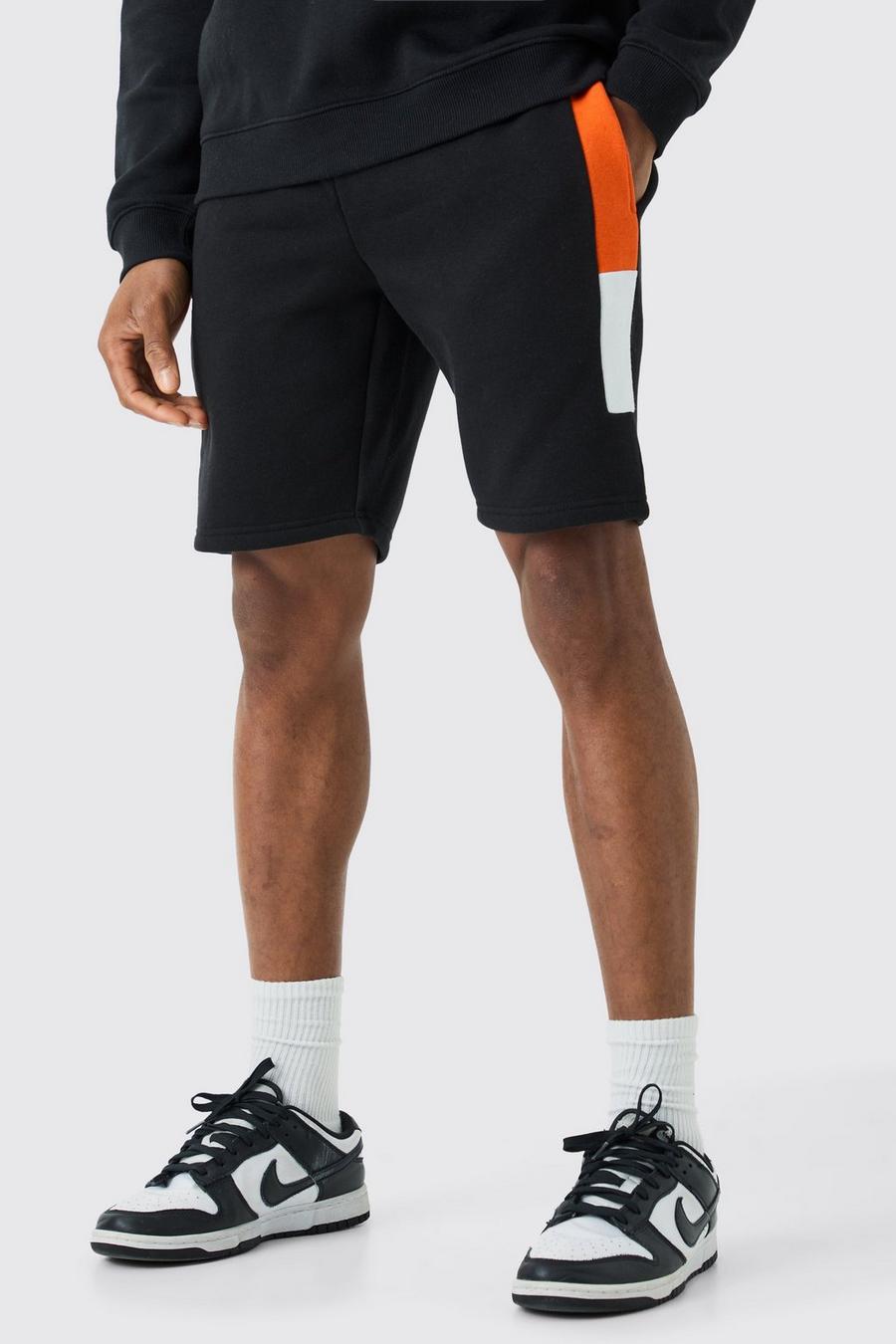 Man Signature Slim-Fit Colorblock Shorts, Black image number 1