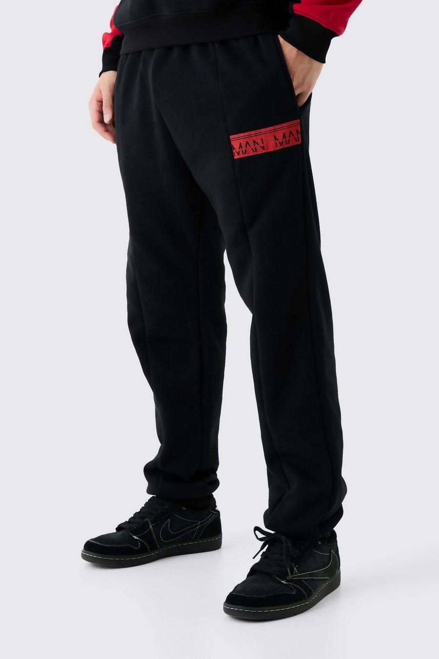 Pantaloni tuta con striscia laterale Man, Black image number 1