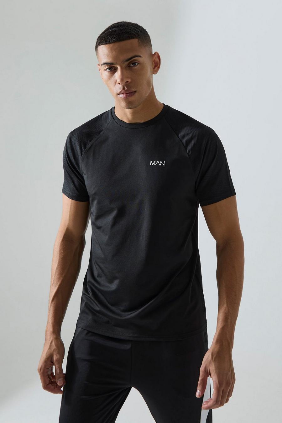 Camiseta MAN Active de jacquard con estampado geométrico, Black