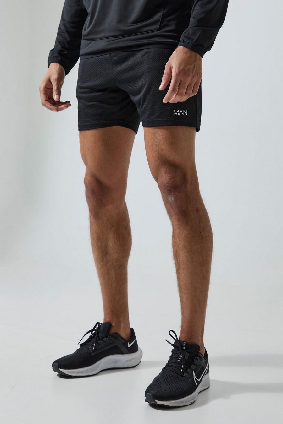 Black MAN Active Mönstrade shorts i jacquardväv (5 tum). image number 1