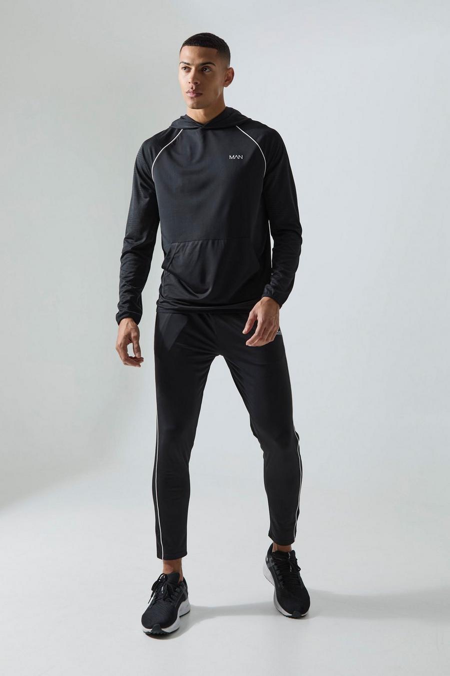 Man Active Jacquard Trainingsanzug, Black image number 1