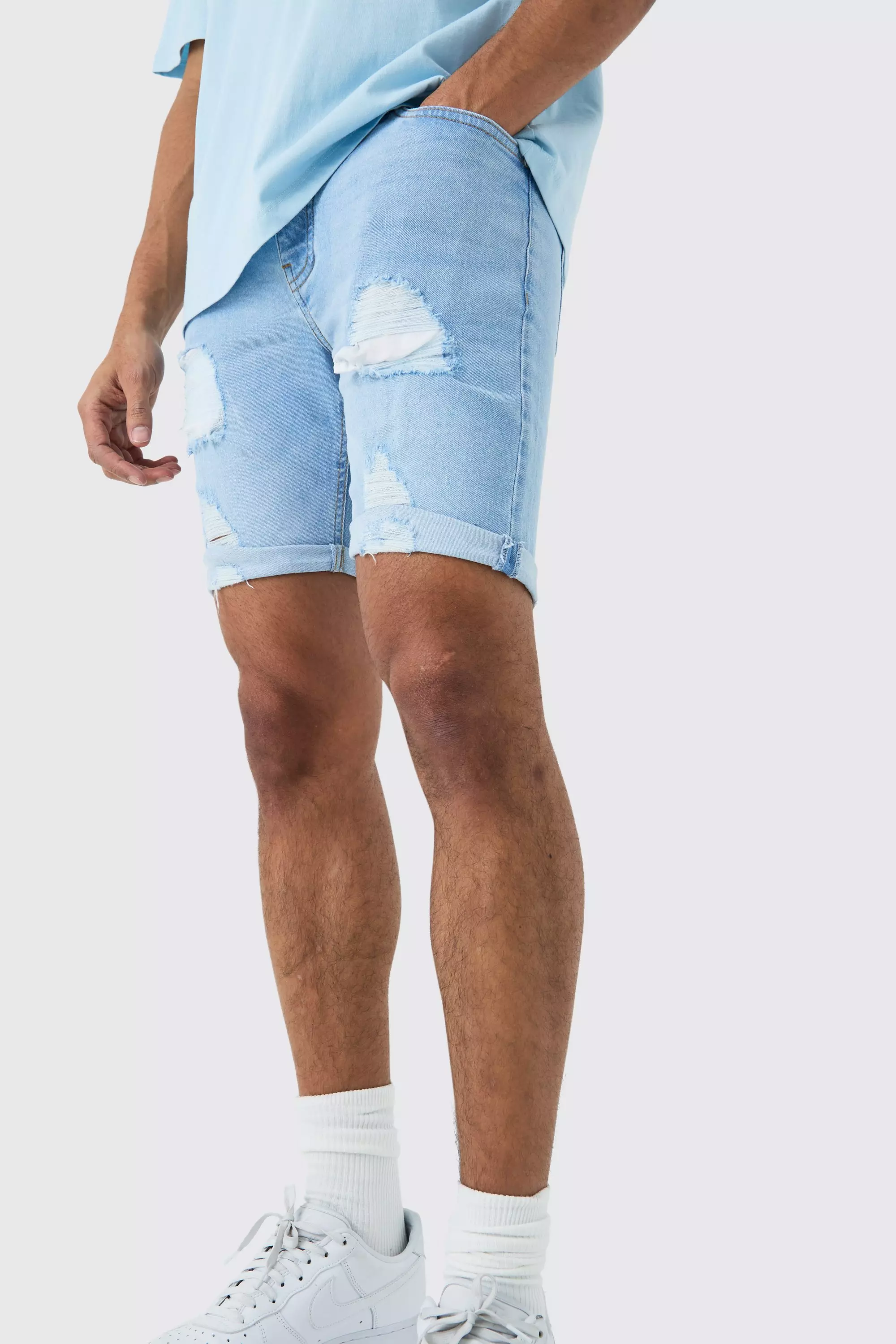 Skinny Stretch Distressed Denim Shorts In Light Blue alternative image