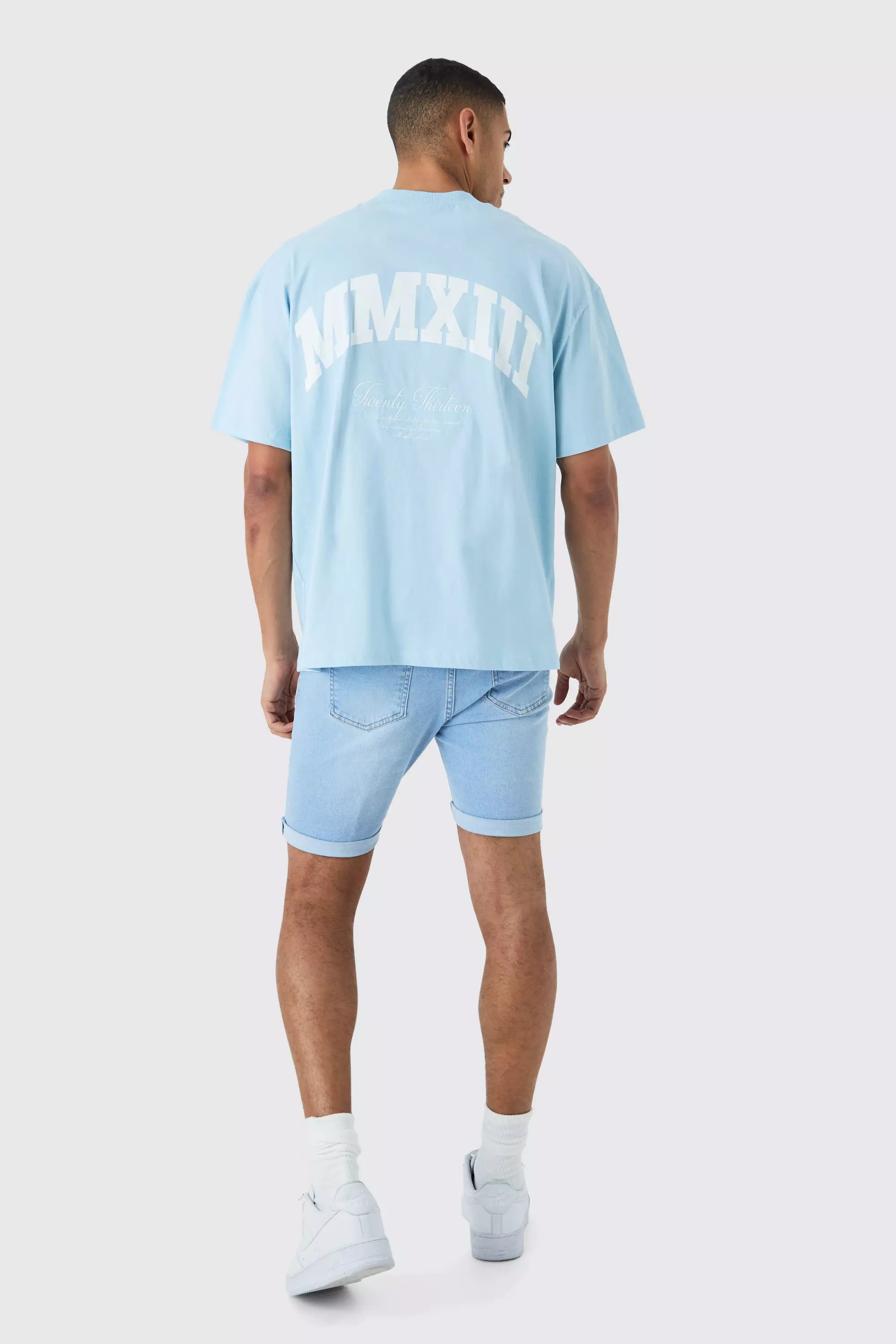 Skinny Stretch Distressed Denim Shorts In Light Blue alternative image