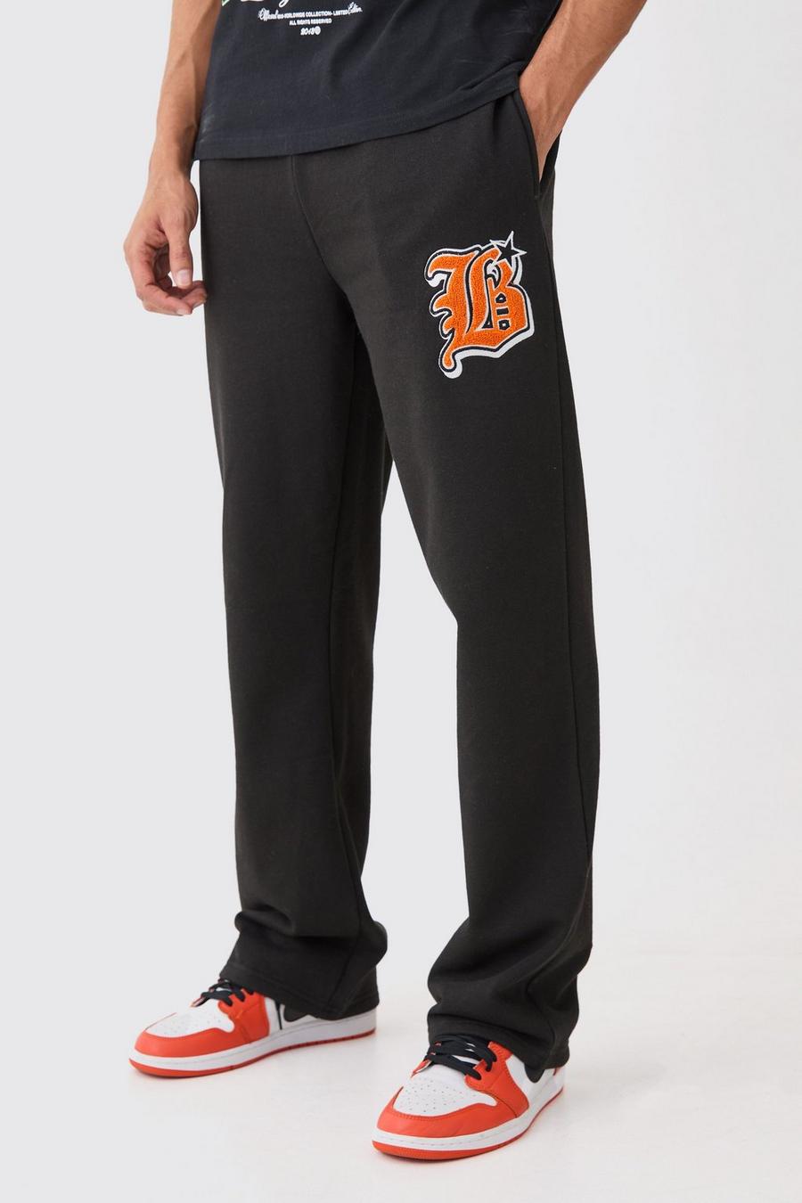 Pantalón deportivo holgado con aplique universitario, Black image number 1