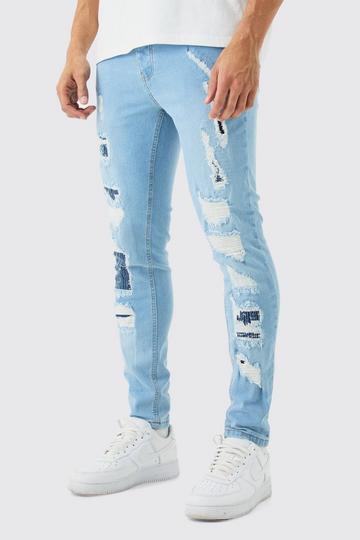 Brown Skinny Stretch All Over Ripped Light Blue Jeans
