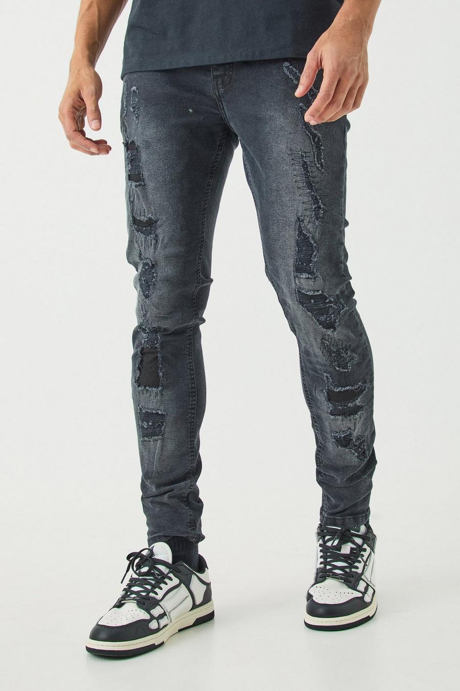 Schwarze Skinny Stretch Jeans mit Rissen, Washed black image number 1