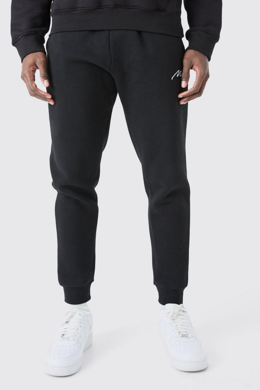Pantalón deportivo ajustado con firma MAN, Black image number 1