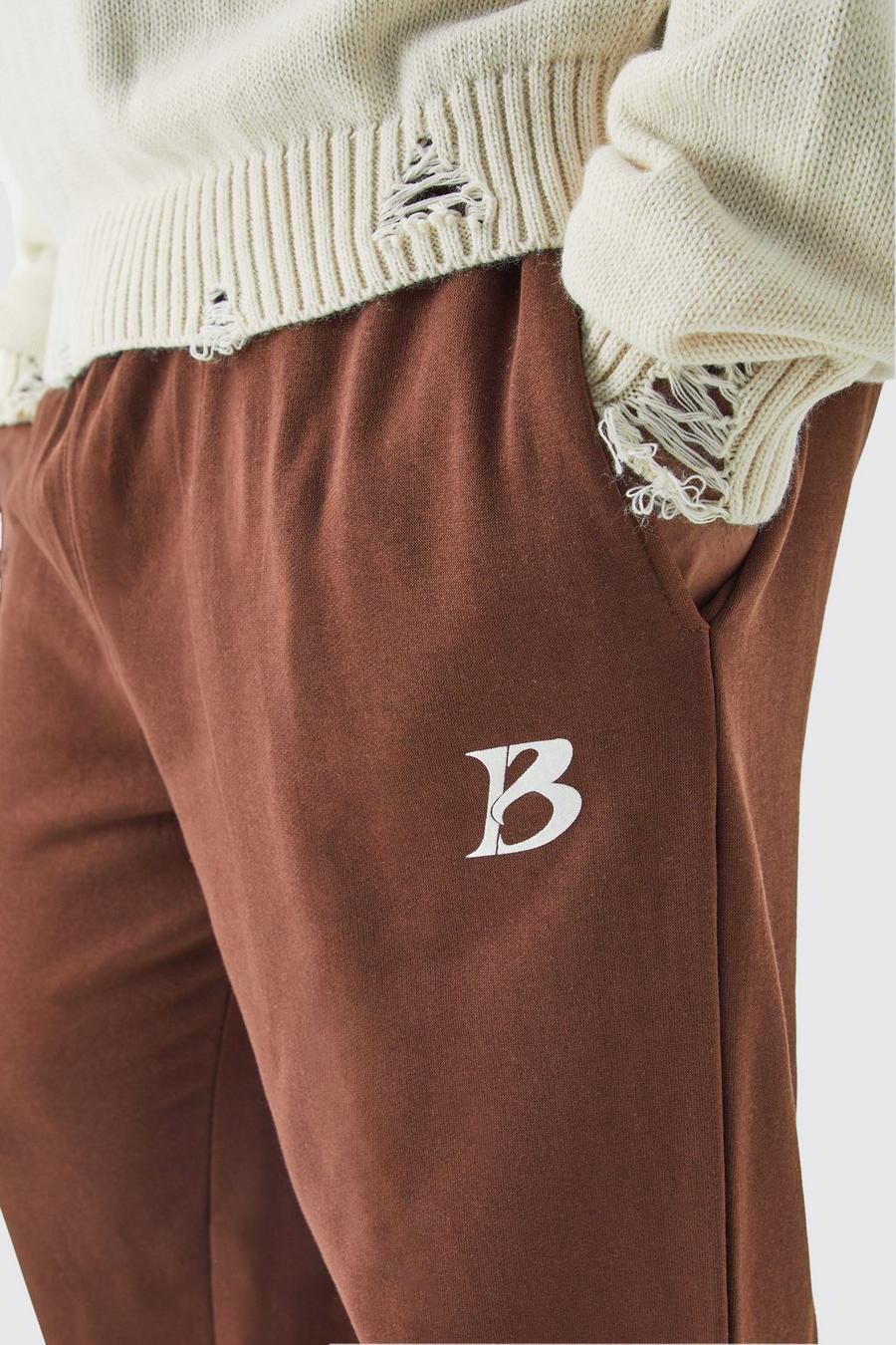 Pantaloni tuta Plus Size color cioccolato con slogan Core B, Chocolate image number 1