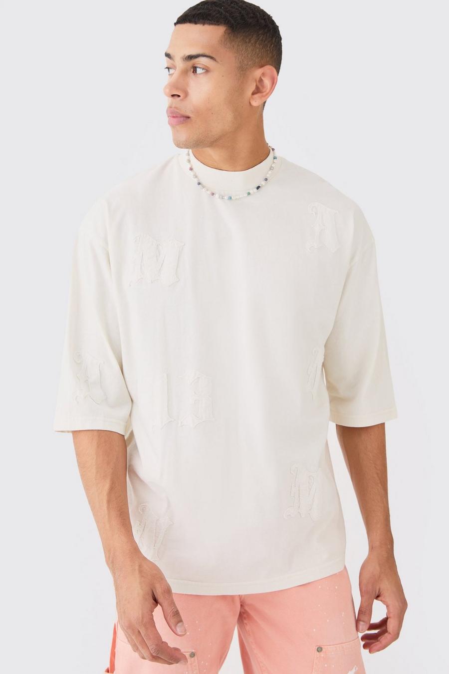 Camiseta oversize gruesa con lavado de ácido, manga corta y apliques, Ecru