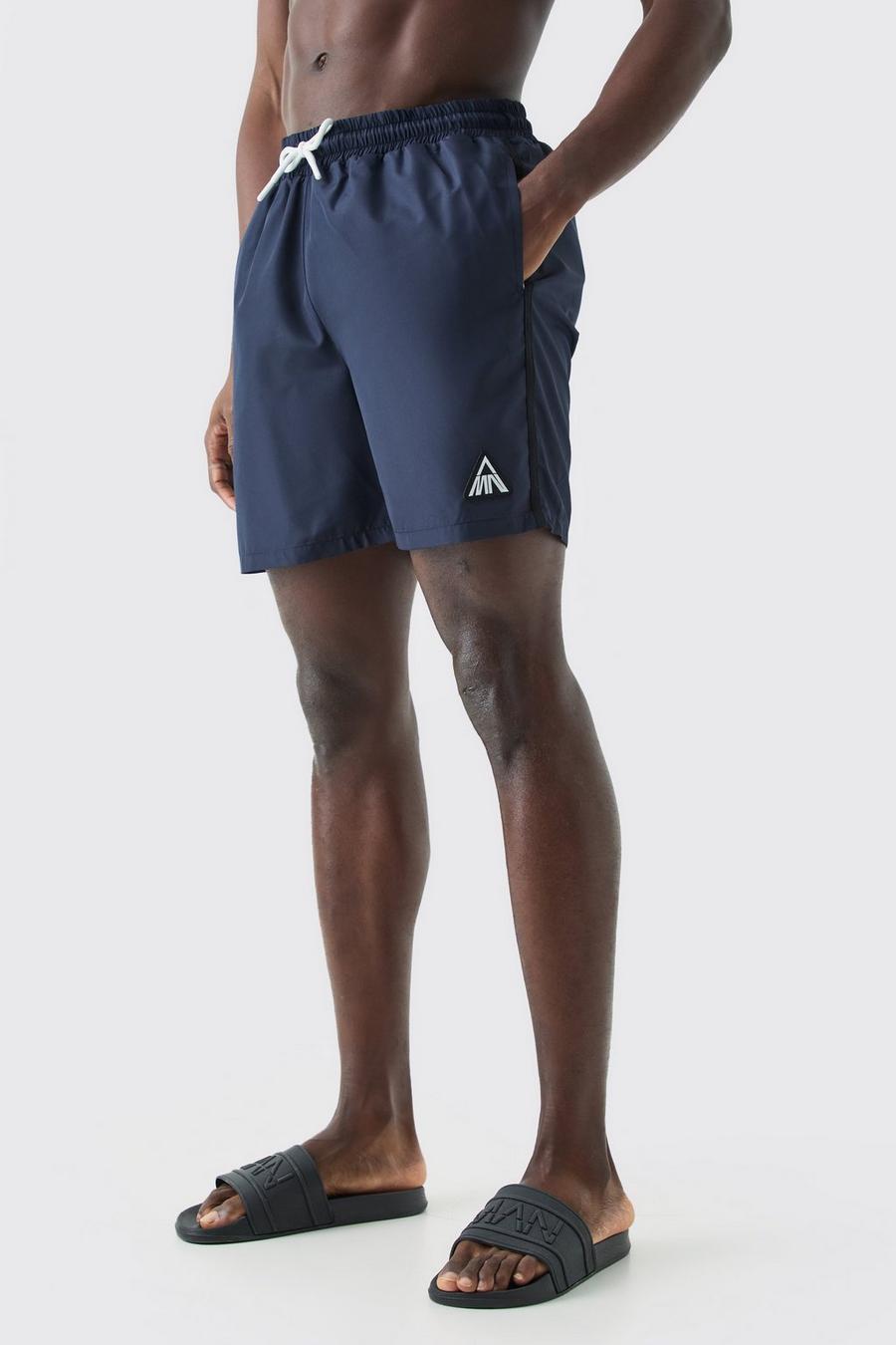 Navy Mid Length Man Triangle Piping Swim Short image number 1