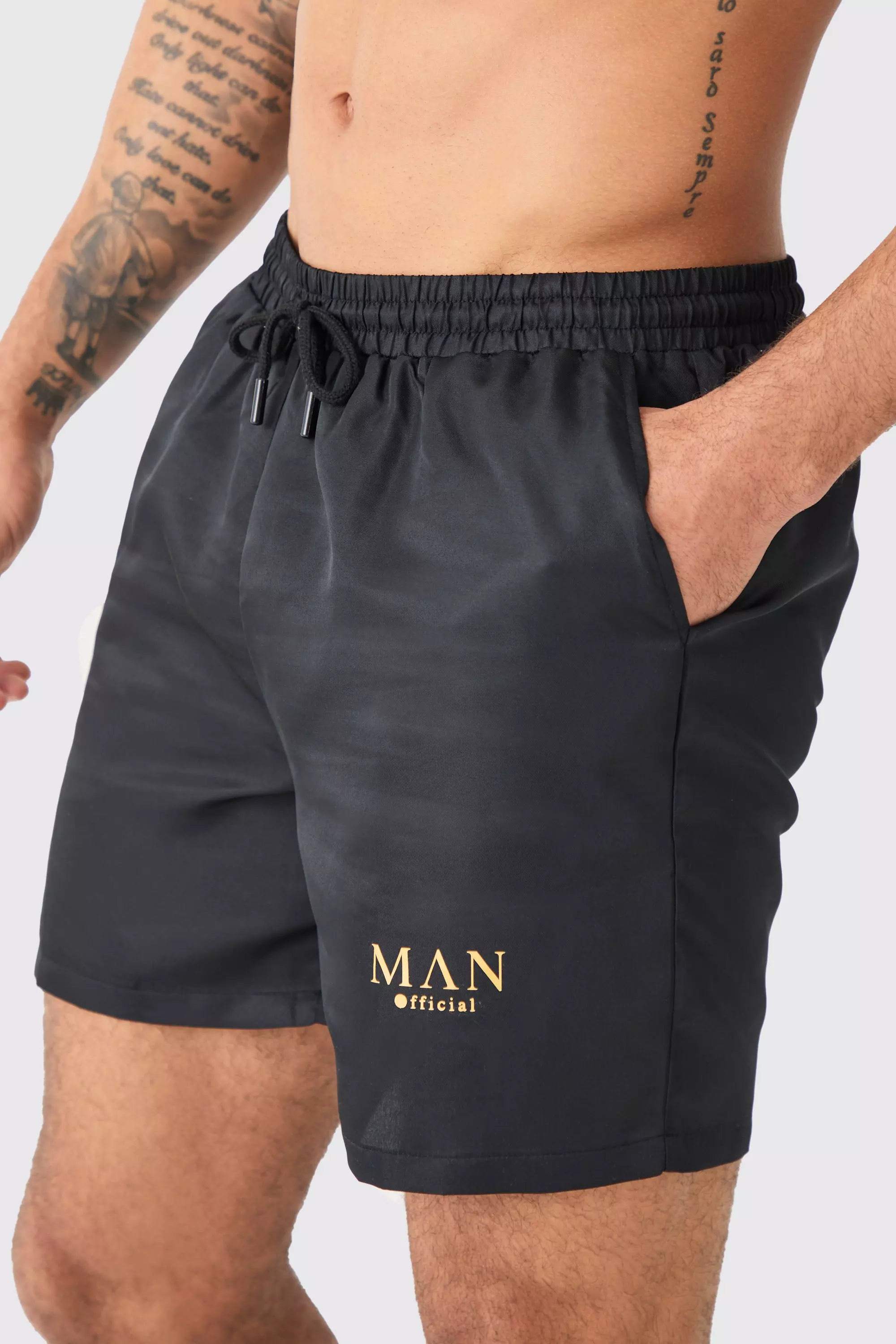 Black and gold swim trunks online