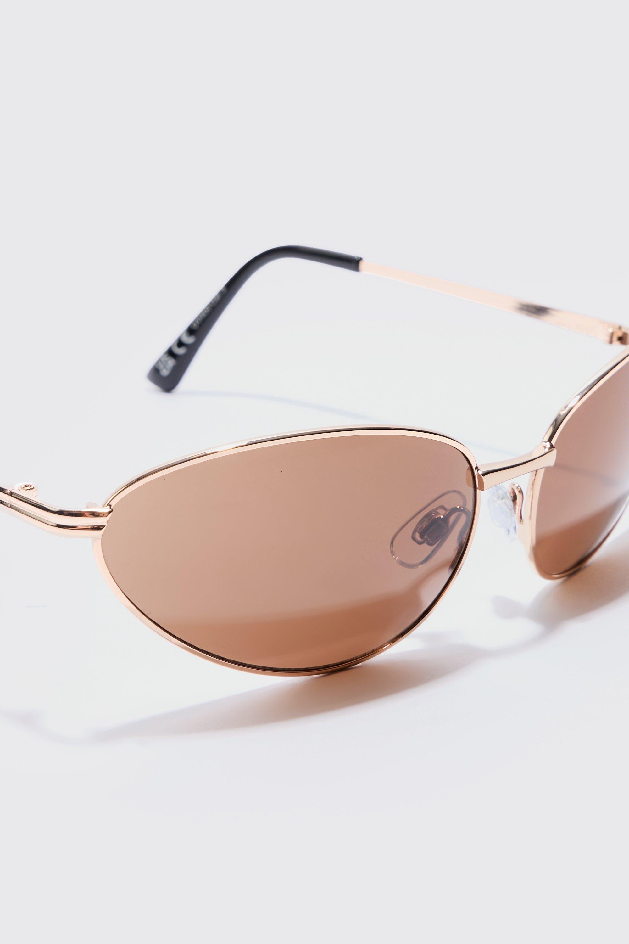 Occhiali da sole angolati in metallo con lenti marroni color oro