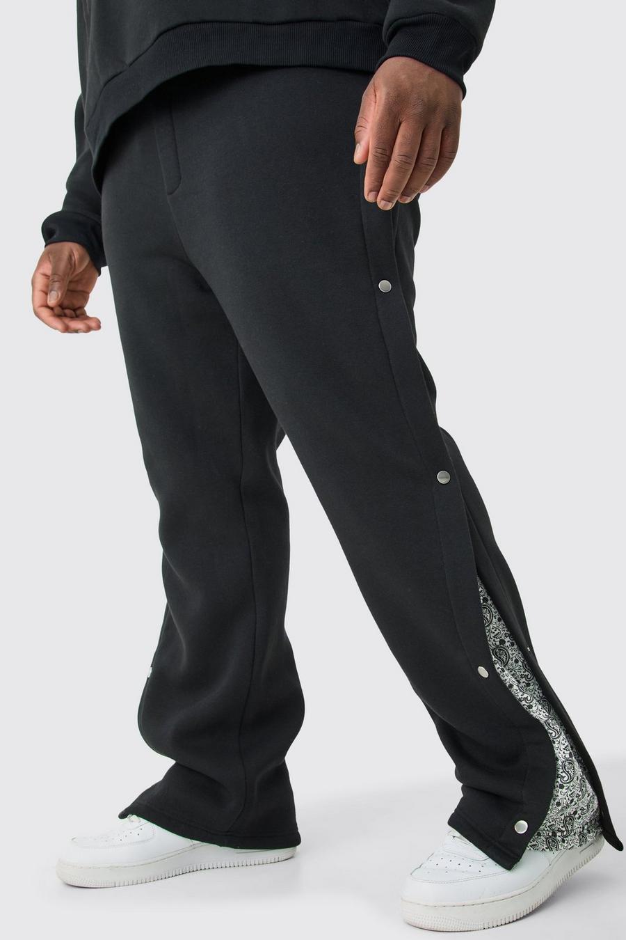 Pantaloni tuta Plus Size rilassati con stampa e pannelli laterali con bottoni a pressione, Black image number 1