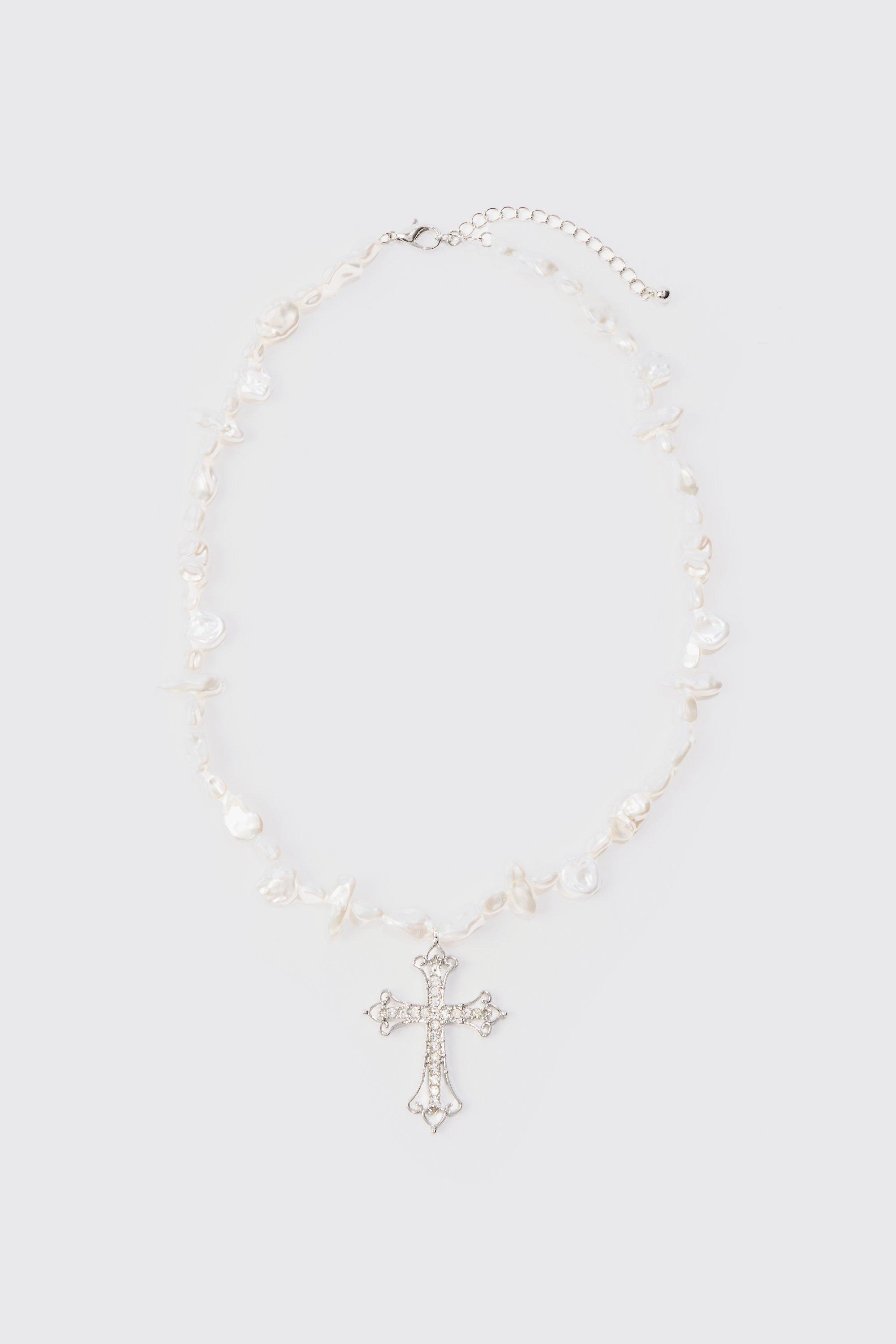 Collier perlé à pendentif croix strassé