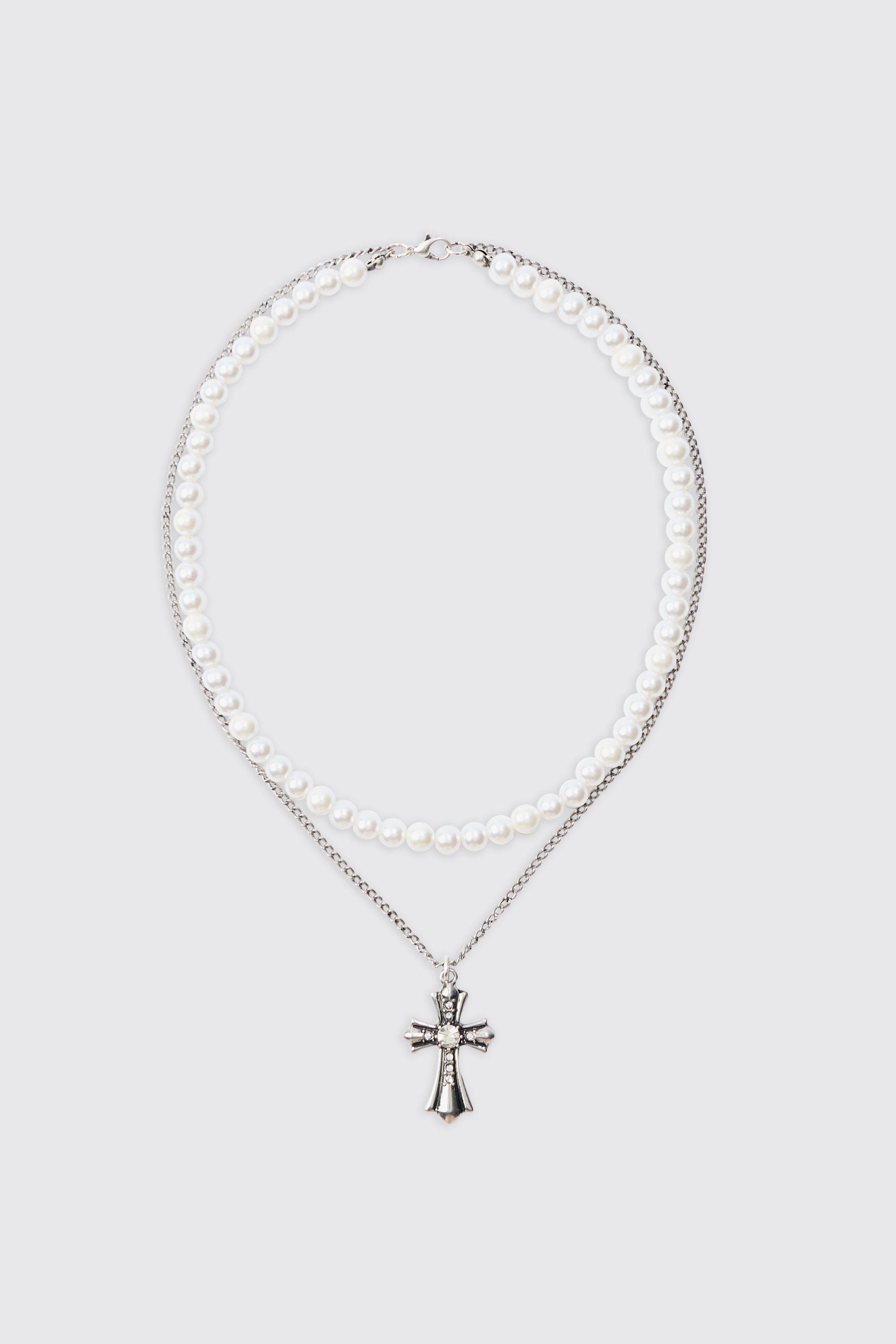 Collier perlé et chaîne à pendentif croix