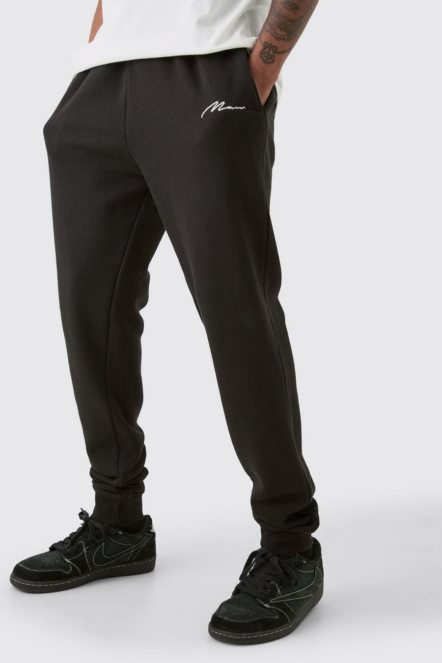 Pantaloni tuta Tall Slim Fit neri con firma Man, Black image number 1