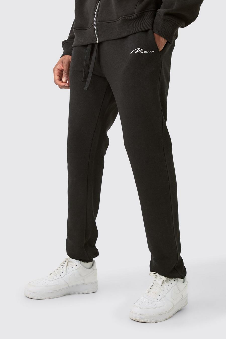 Pantaloni tuta Tall Skinny Fit neri con firma Man, Black image number 1