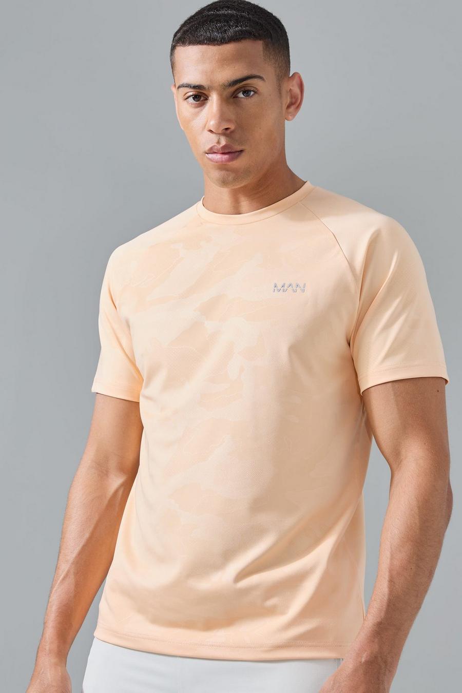 T-shirt Man Active per alta performance in fantasia militare con maniche raglan, Orange image number 1