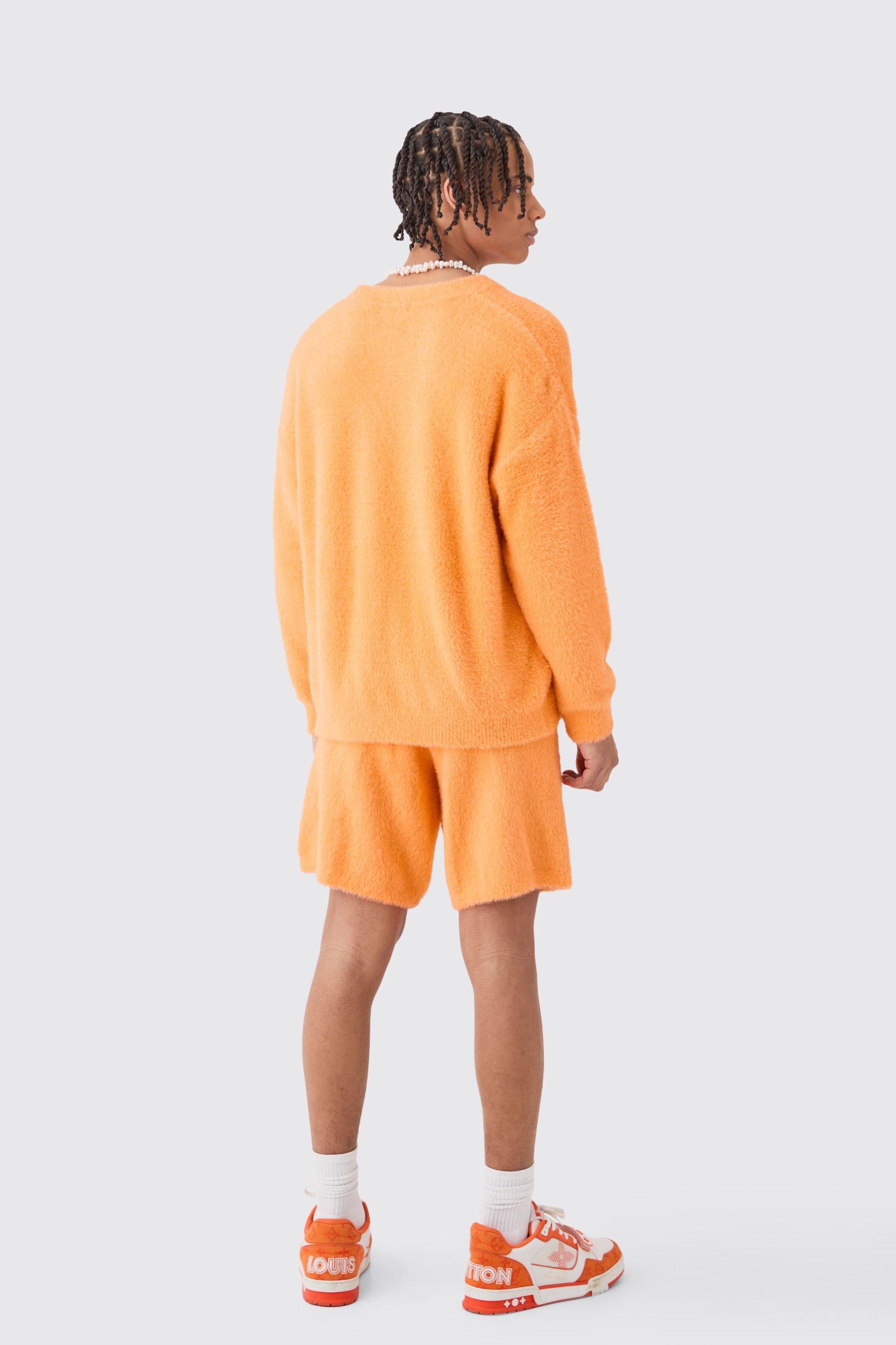 Orange fluffy jumper best sale