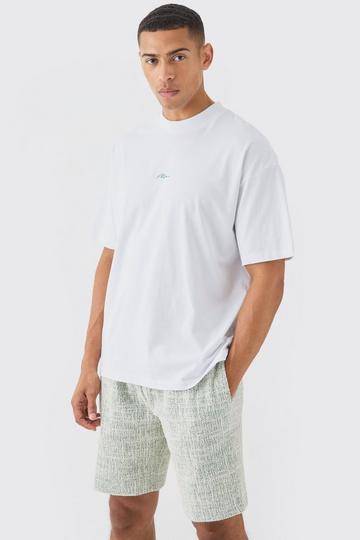 Man Oversized Extended Neck T-shirt And Textured Shorts Set green