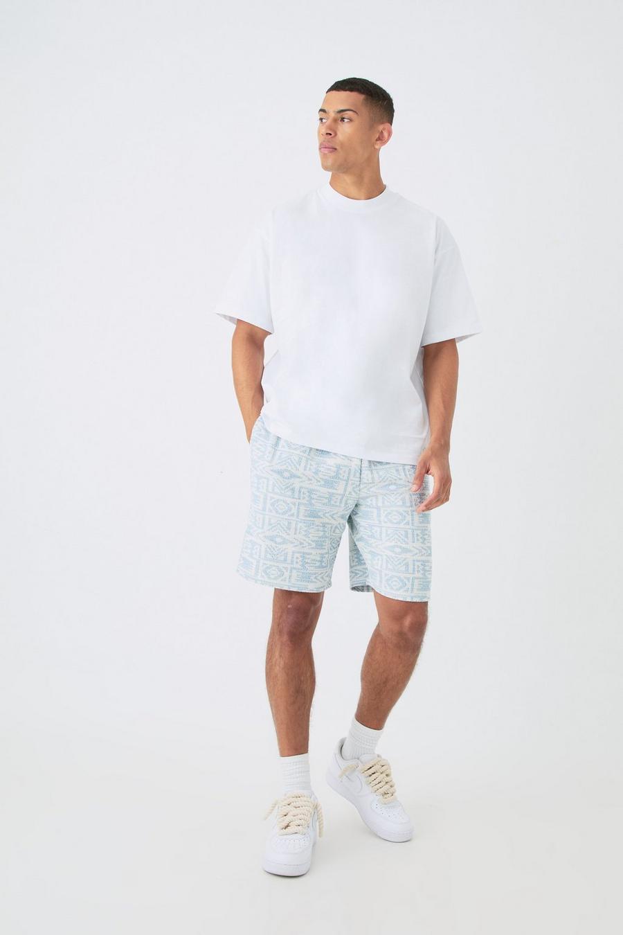 Blue MAN Oversize t-shirt med hög halsringning och jacquard shorts image number 1
