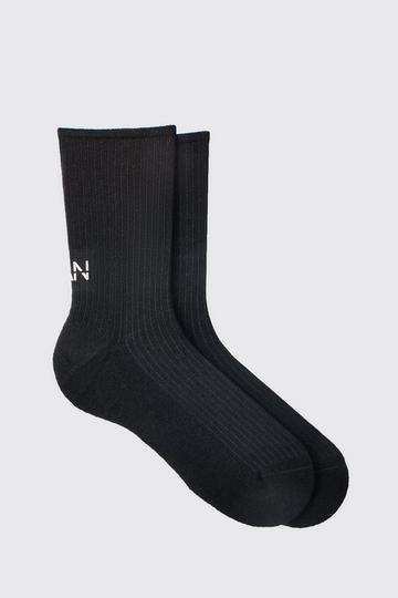 Black Man Dash Ribbed Socks In Black