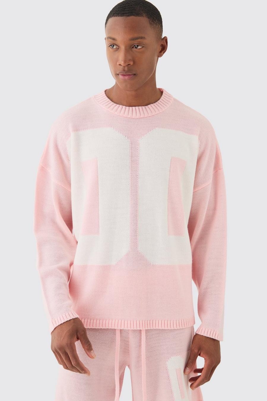 Pink Oversize stickad tröja i varsitystil