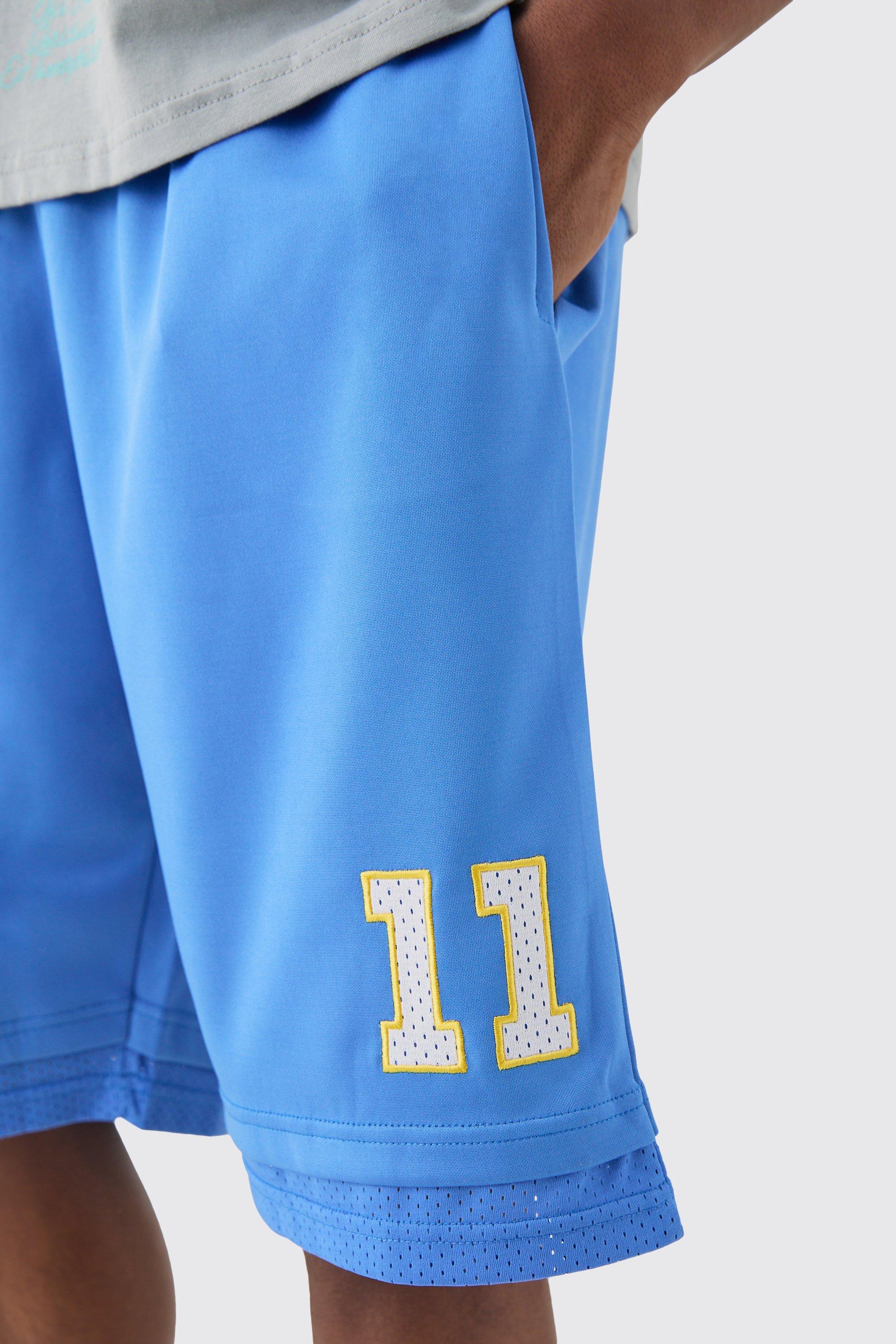 boohooMAN Men s Loose Fit Satin Mesh Basketball Shorts Blue