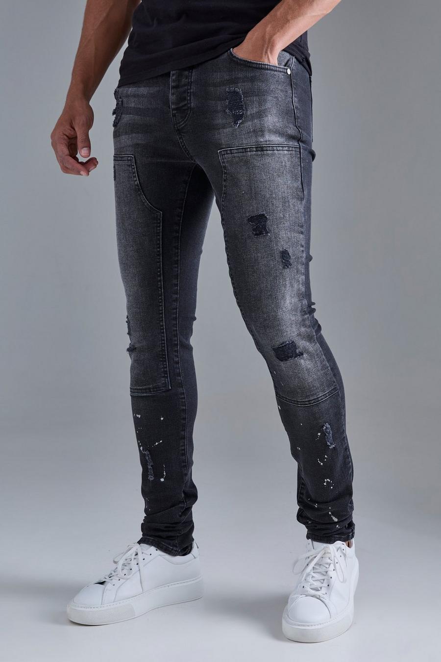 Jeans Skinny Fit Stretch neri con strappi, pieghe sul fondo e zip sul fondo, Black