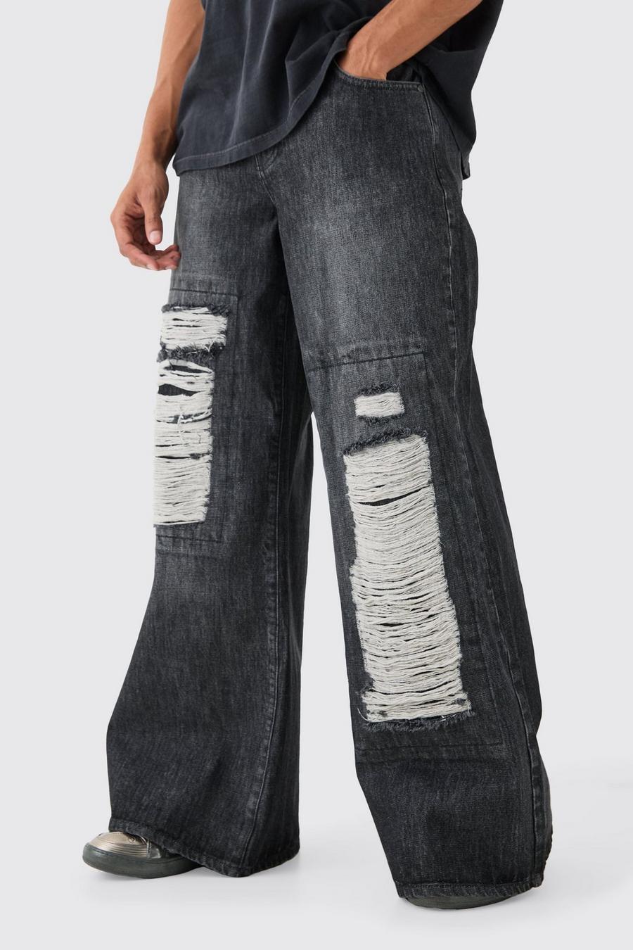 Washed black Baggy jeans i rigid denim med slitage