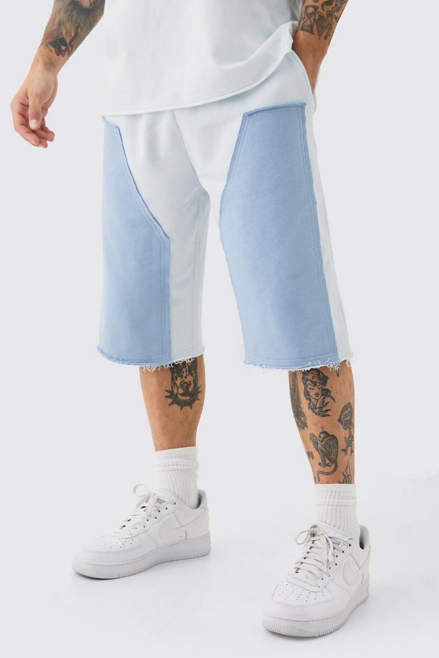 Pantaloni tuta extra comodi con pannelli Carpenter e applique con bordi sfilacciati, Light blue