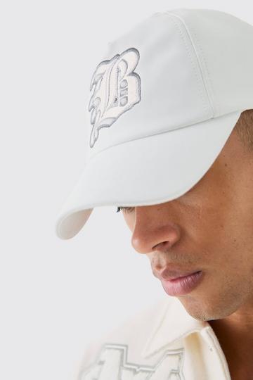 White PU Applique Cap In White