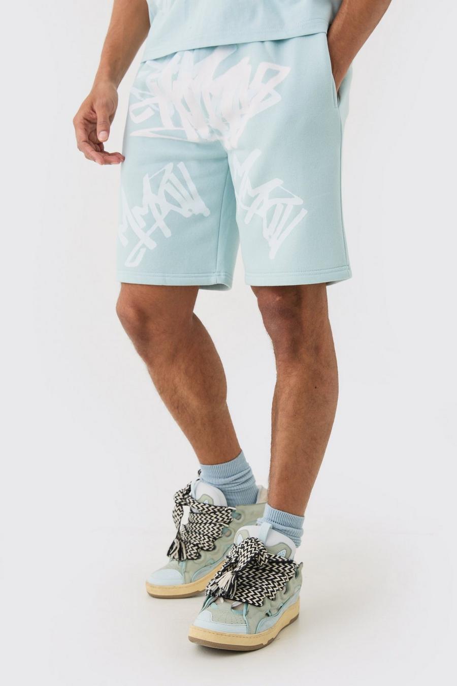 Blue Loose Fit Graffiti Printed Jersey Shorts image number 1