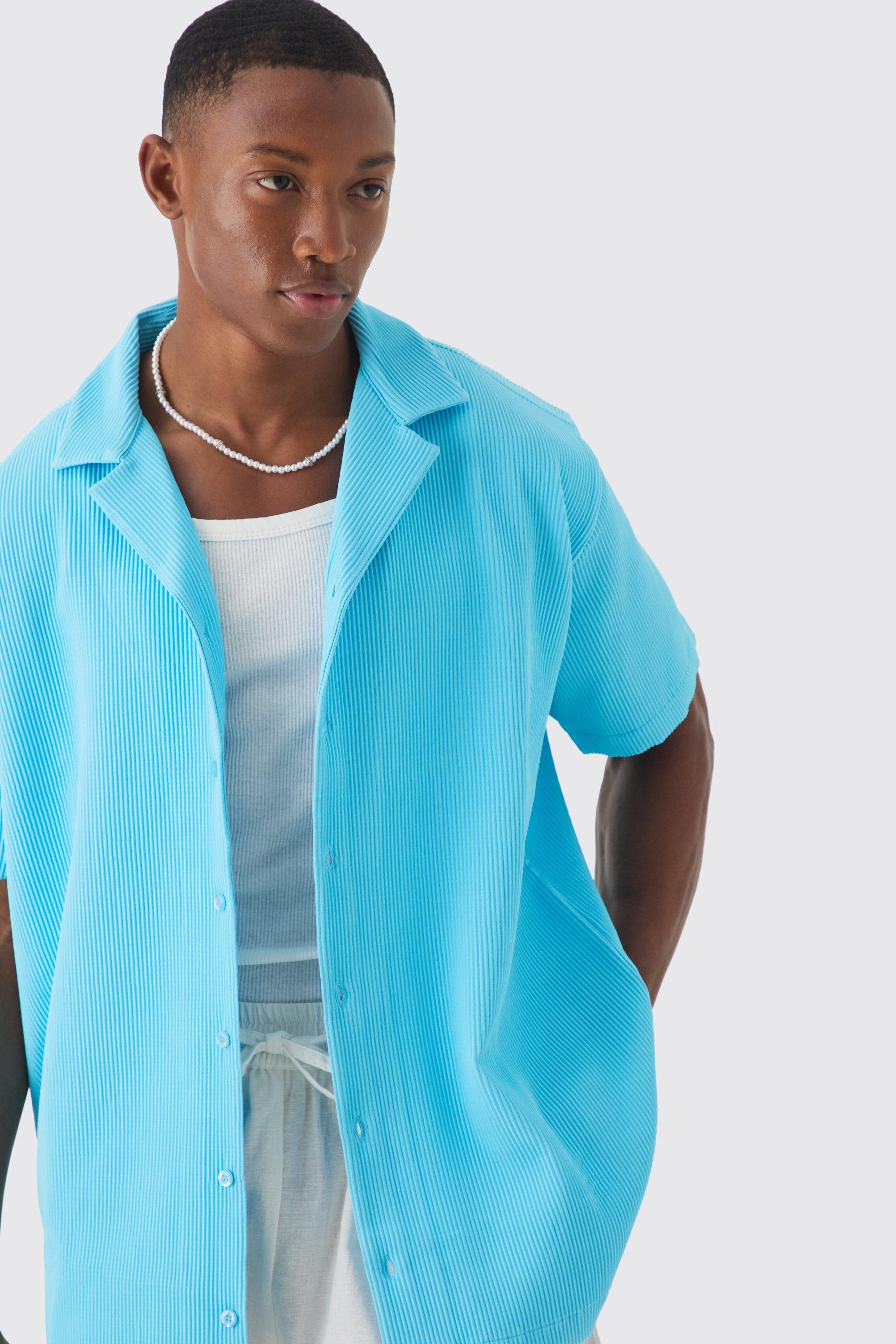 Camisa oversize plisada de manga corta con solapas