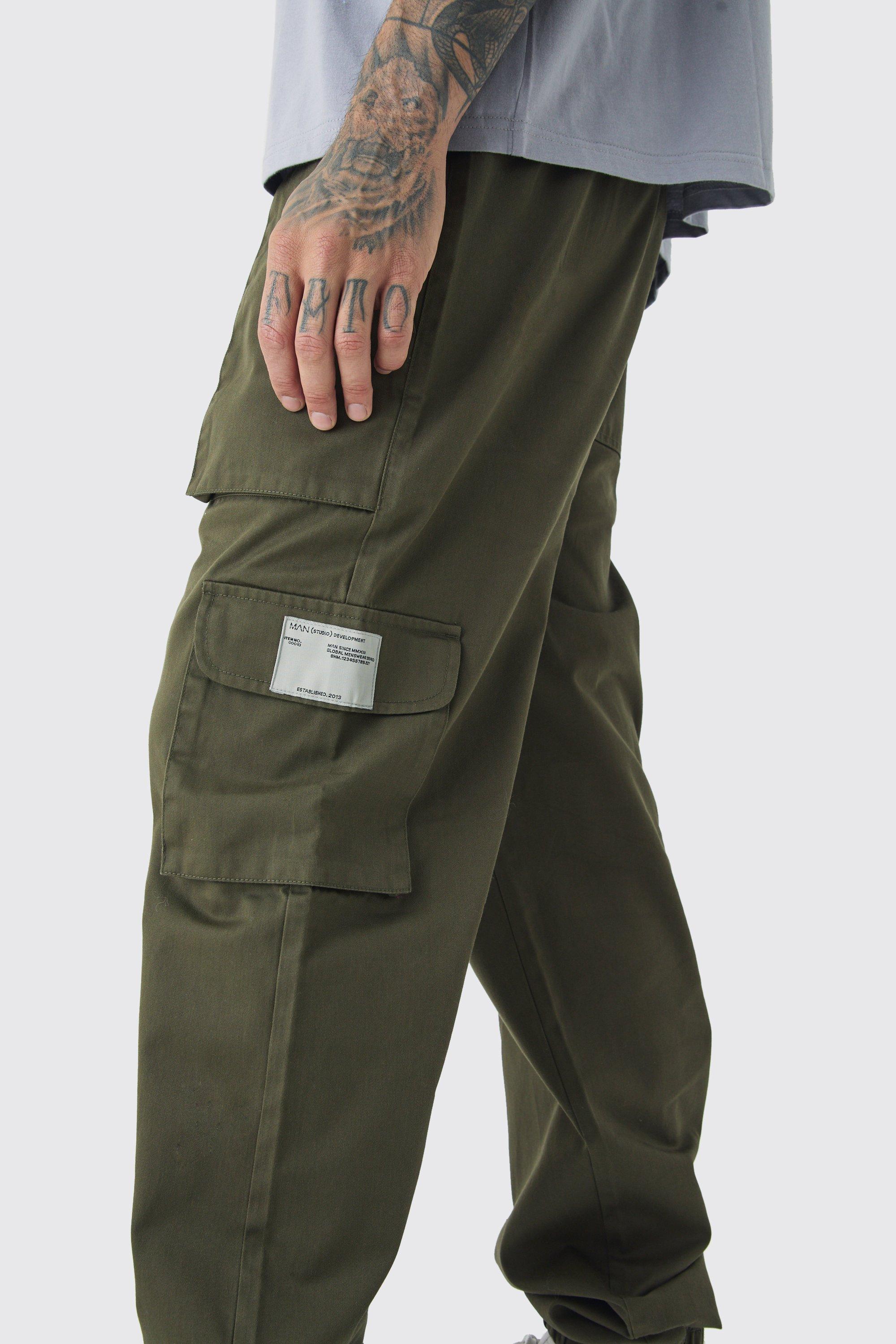 boohooMAN Men s Tall Cuffed Hem Woven Tab Cargo Trousers In Khaki