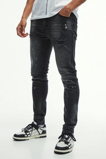 Skinny Stretch Knee Rip Paint Splatter Jeans washed black