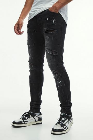 Skinny Stretch All Over Rip & Repair Paint Splatter Jeans washed black