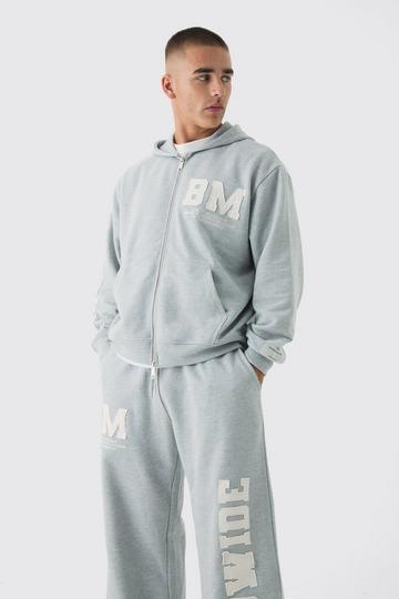 Oversized Boxy Worldwide Raw Edge Applique Zip Through Tracksuit grey marl