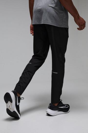 Man Active Stretch Woven Reflective Tapered Jogger black