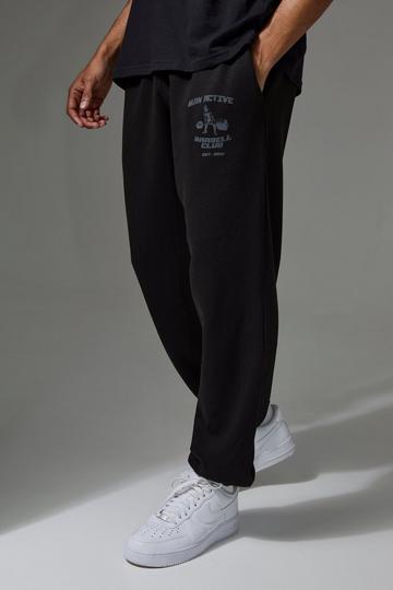 Jogging de sport oversize à slogan - MAN Active black