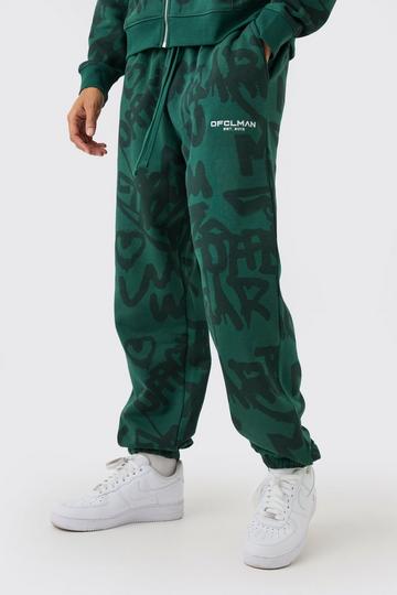 Oversized All Over Graffiti Printed Joggers dark green