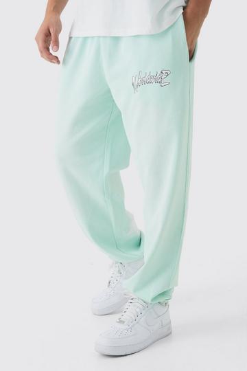 Oversized Worldwide Spray Wash Printed Joggers turquoise