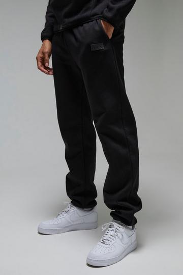 Man Active Regular Fit Badge Jogger black