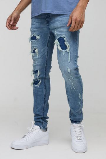 Super Distressed Dirty Wash Skinny Jeans mid wash