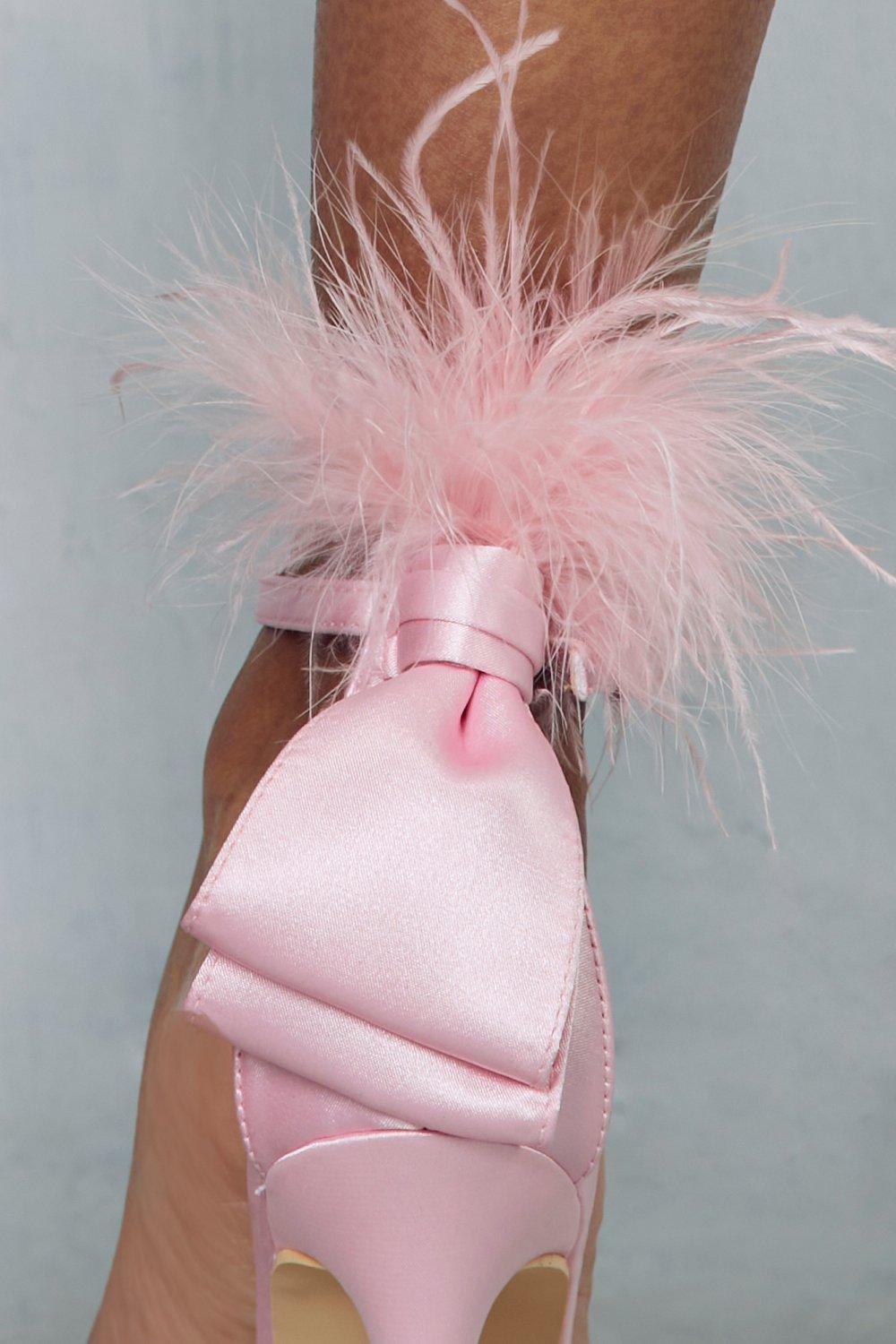 Heels with sale feathers on back